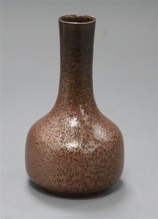 A high-fired stoneware metallic glaze bottle vase, unmarked, ex Geoffrey Godden collection height 14cm